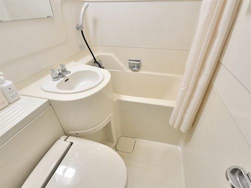 Dai-Ni Sunny Stone Hotel Suita Bagian luar foto