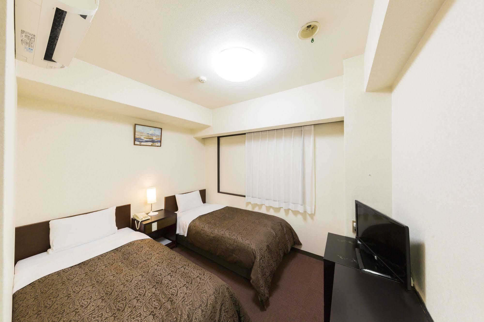 Dai-Ni Sunny Stone Hotel Suita Bagian luar foto